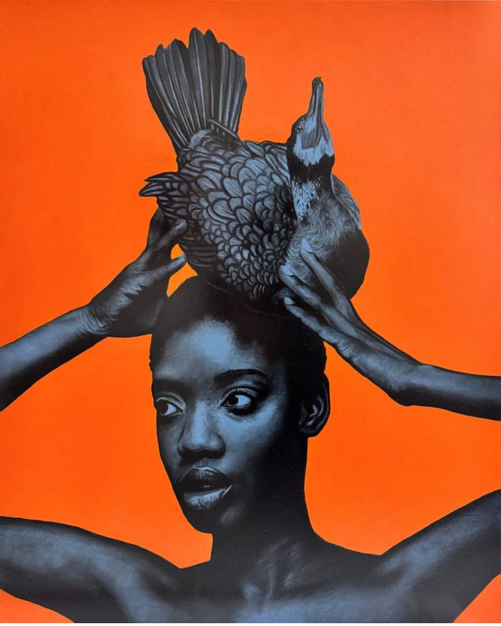 Feel the Blue III by Ritchelly Oliveira: a woman rendered in blue tones holding a dark bird on top of her head with both hands, against a bright orange ground