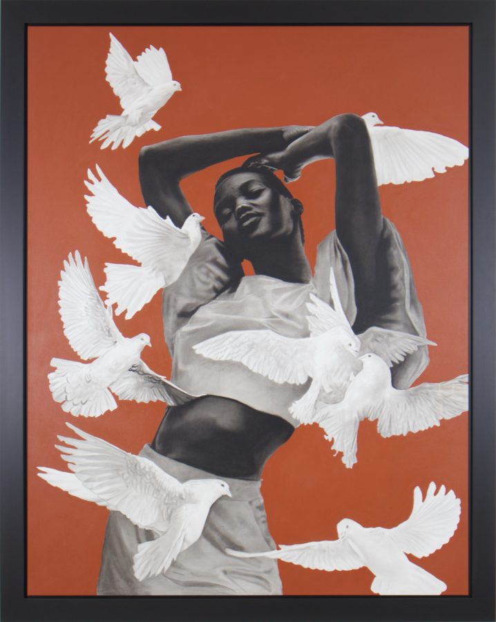Recomeço by Ritchelly Oliveira: a woman standing with her arms raised above her head, surrounded by white doves in flight, against a rust-brown ground